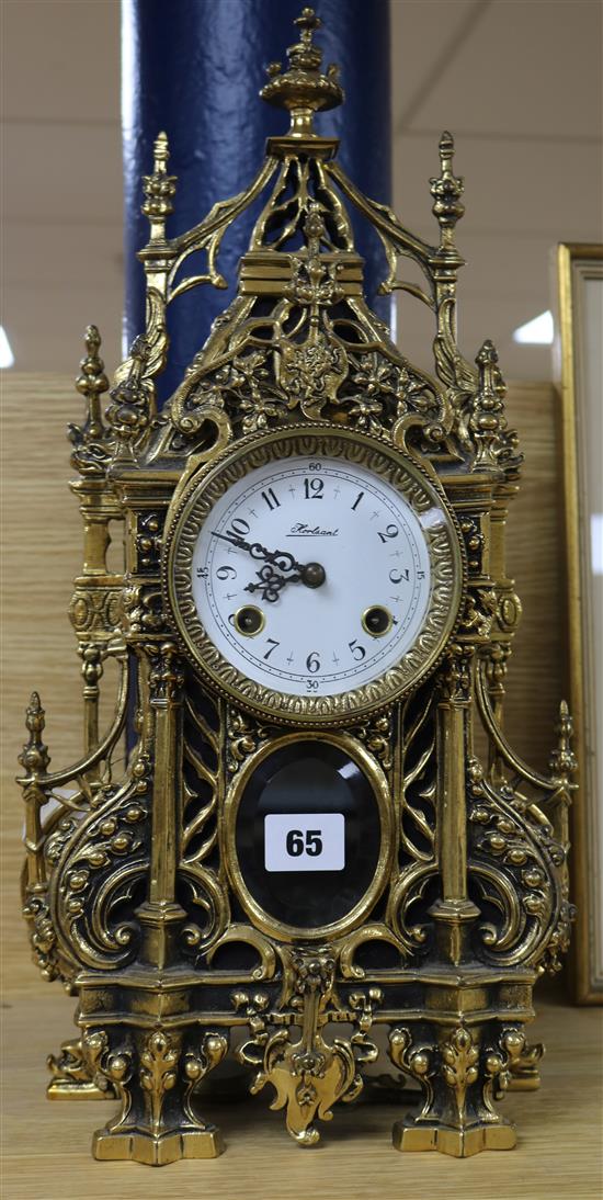 A brass mantel clock